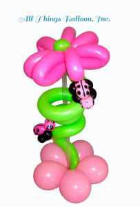 Balloon decor: balloon Centerpiece -balloon lady bugs and balloon flower