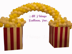 balloon decorator - balloon arch; popcorn theme