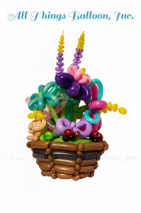 balloon artist: large balloon vase with flowers, ladybugs, fairy