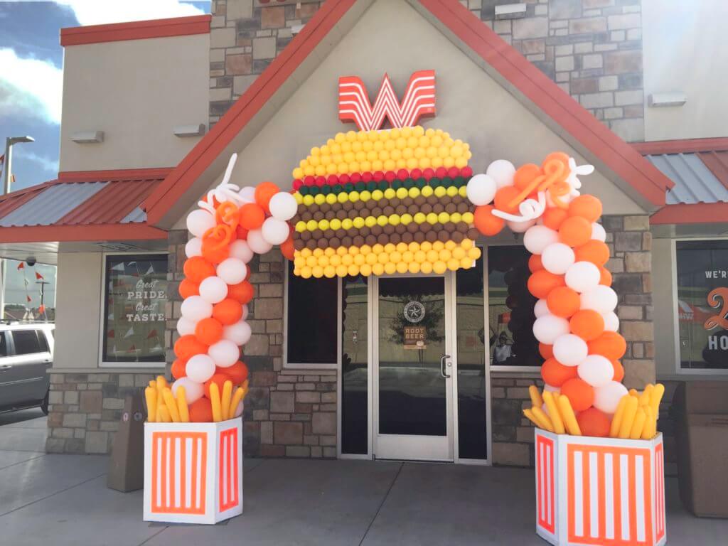 What A Burger Grand Opening arch with Balloon Fries and Balloon Burger