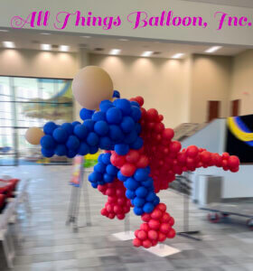 Balloon decor - 9'tall caped super hero